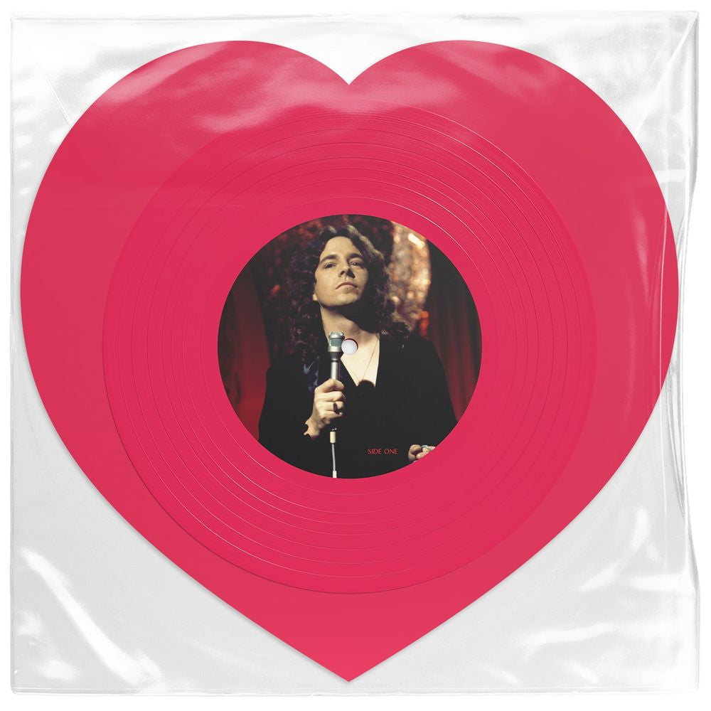 the album cover for John Paul Young - Love Is in the Air [Heart-Shaped Rose Color]