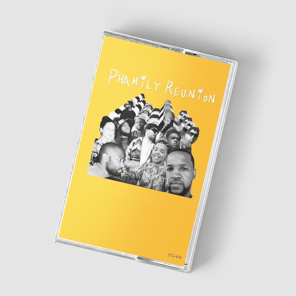 A clear plastic cassette-style album case with a bright yellow cover, angled on a light gray background. The cover has the text 'FAMILY REUNION' in white above a black-and-white collage of people.